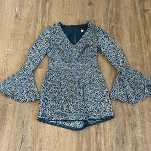 Teal Blue Rain Romper from Francesca’s